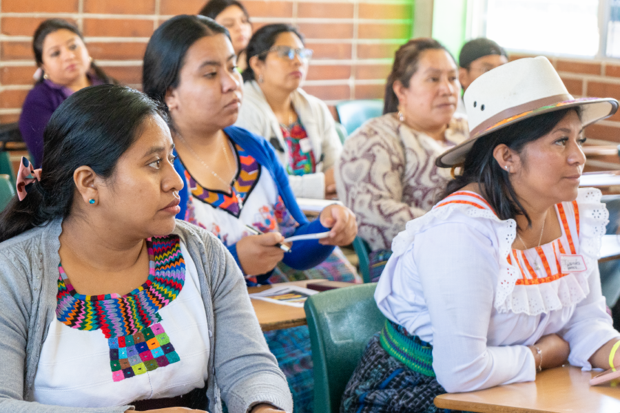 Attendees sitting and paying attention