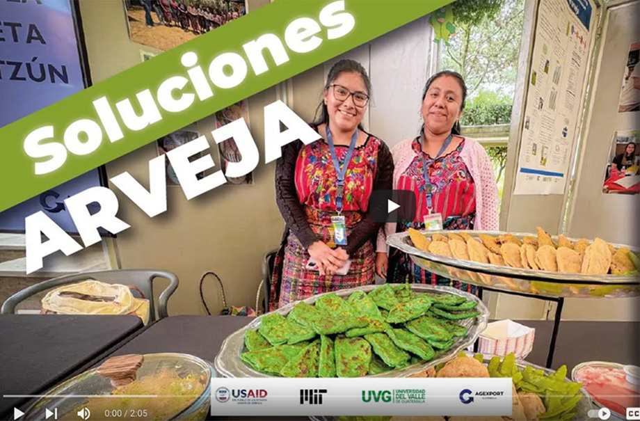 The words Pea Solutions span across a photo of two women with a plate of snow peas